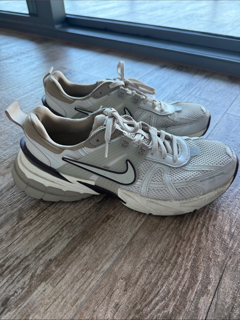 Nike Neutral Tone Running Sneakers with Swoosh